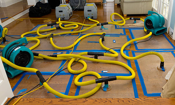 Professional Flood Damage Restoration technician working in Fairmount, GA
